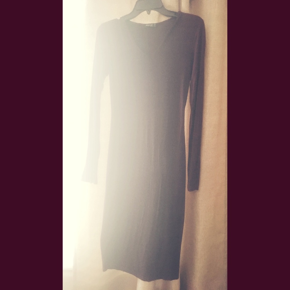 Purple semi-casual form-fitting dress.